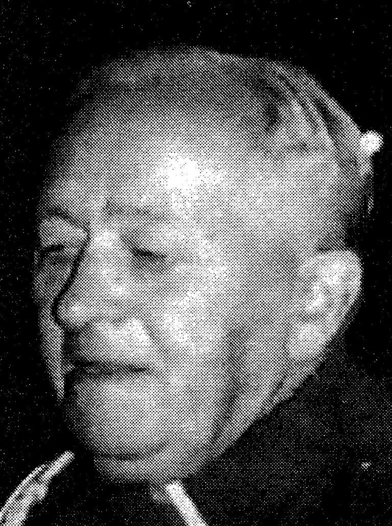 Ziarnisty czarno-biały portret Stanisława Filozofa – widoczna tylko górna część głowy powstańca wielkopolskiego.